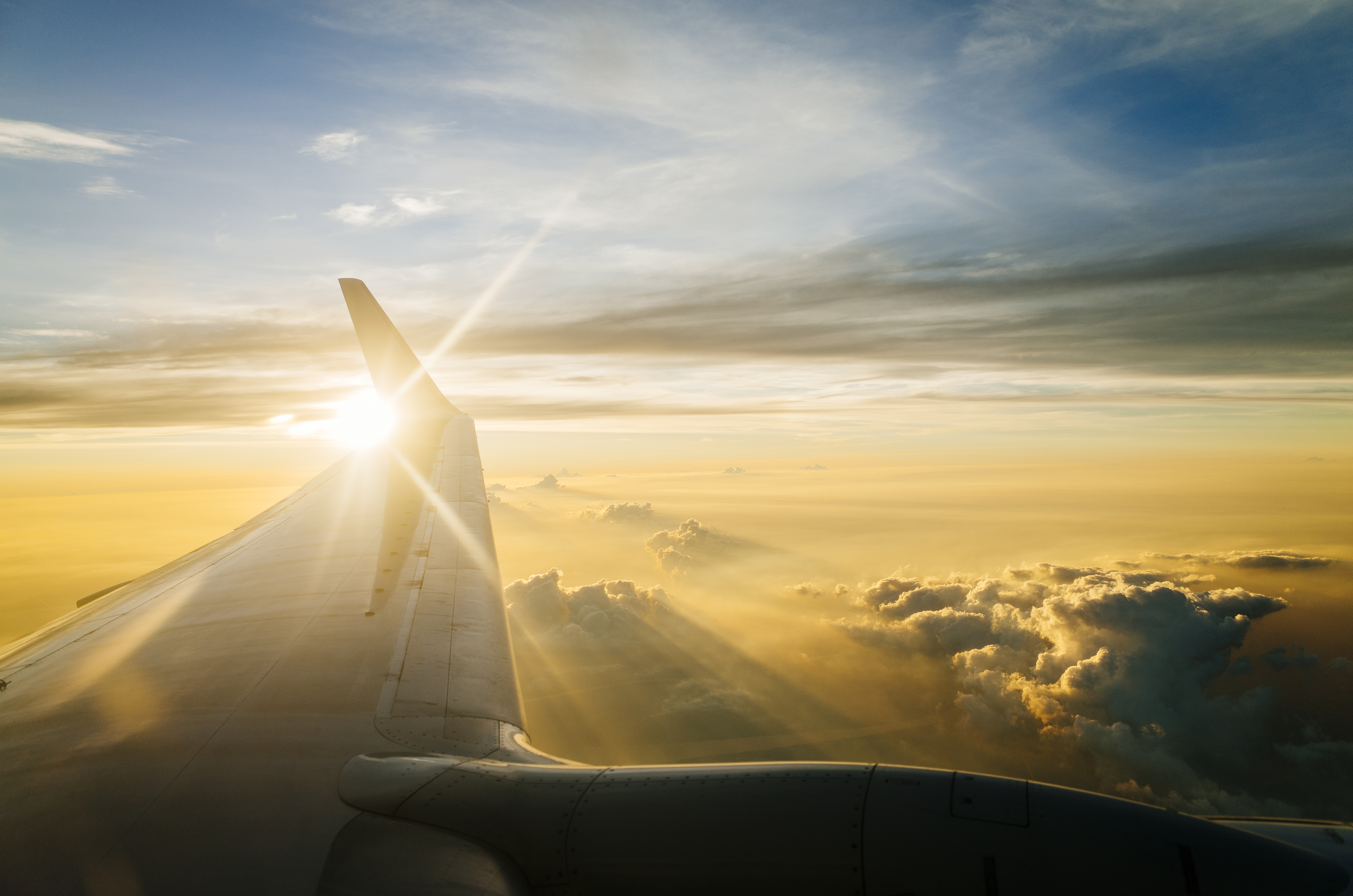 wing-airplane-blue-sky-twilight-sunset